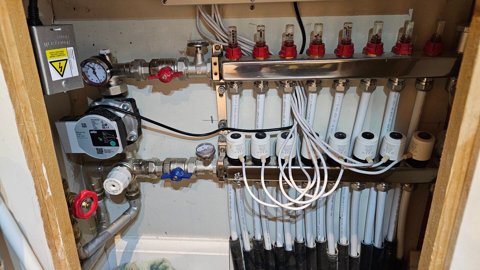 Underfloor heating manifold with actuators Welwyn Garden City